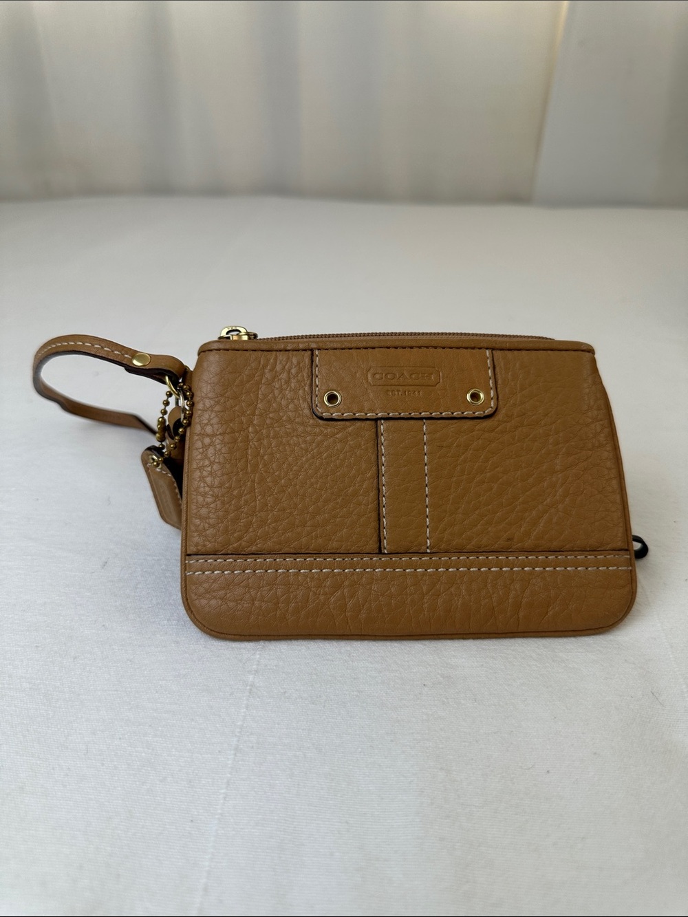 Coach Pebbled Leather Wristlet in Saddle